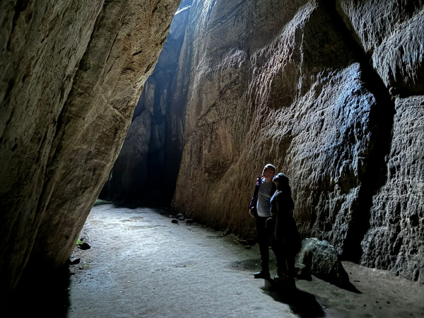 HIkers inside a cave at Tijuca Forest National Park